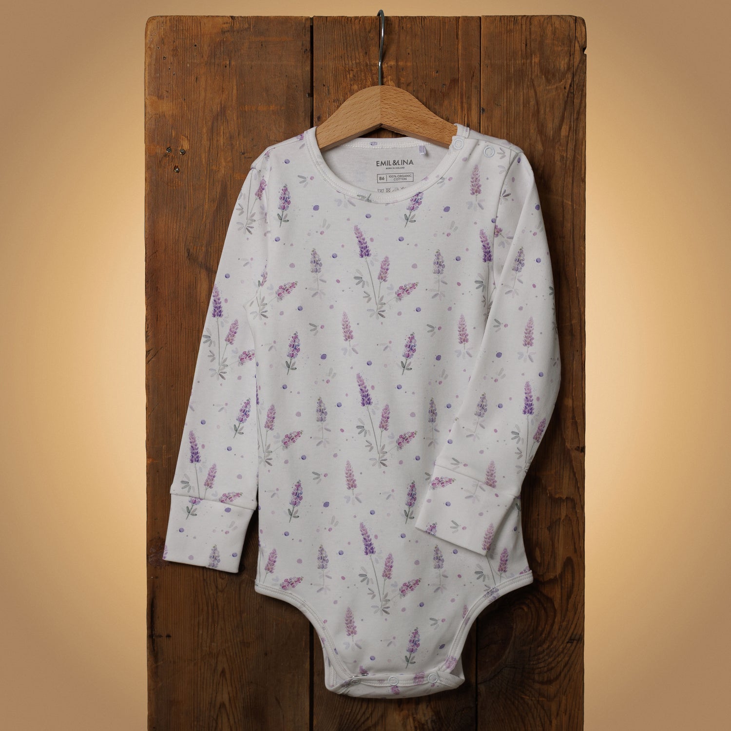 Patterned snap-button long-sleeved baby bodysuit