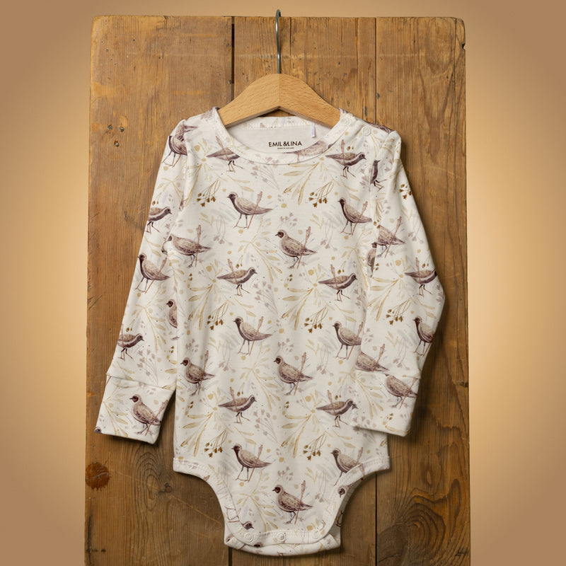 Patterned snap-button long-sleeved baby bodysuit