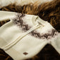 Machine-knit zip-up sweater with pattern