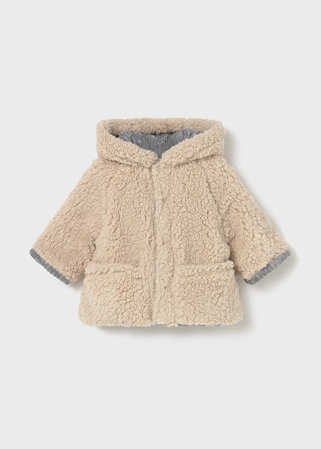 Reversible shearling coat