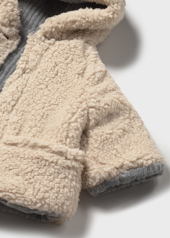 Reversible shearling coat