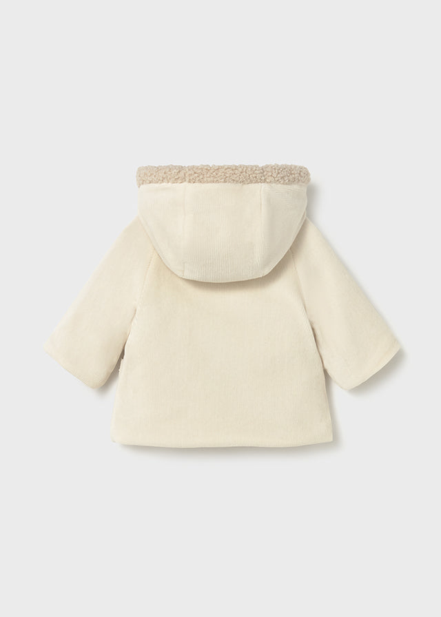 Reversible shearling coat