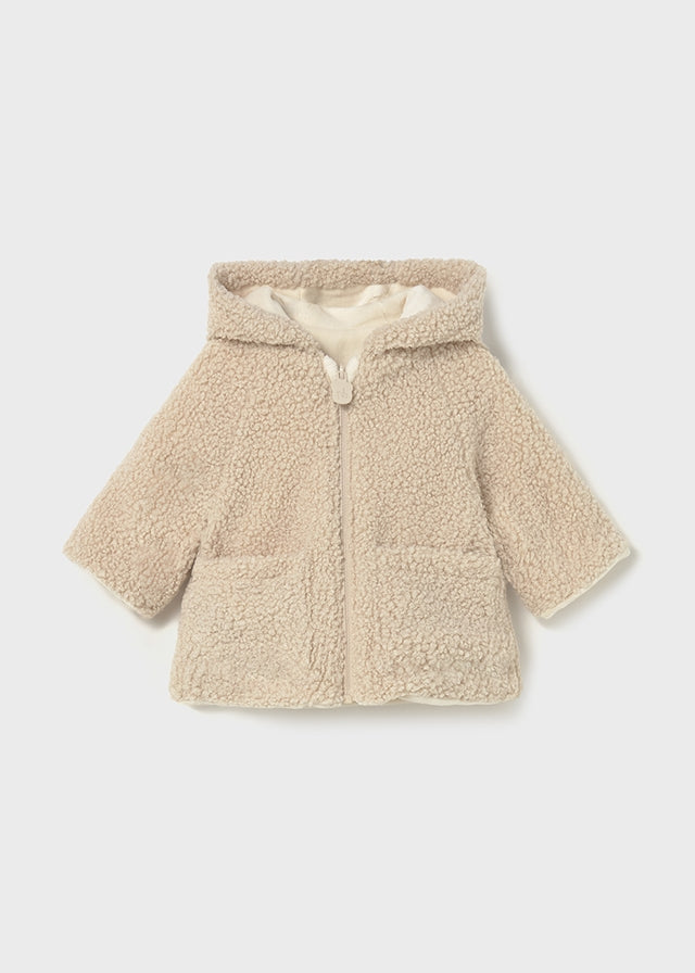 Reversible shearling coat