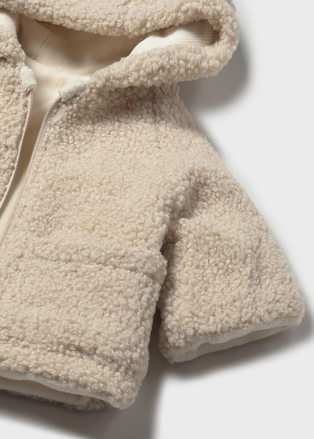 Reversible shearling coat